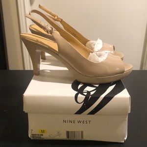 Nine West peep toe sling back heels.